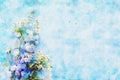 Watercolor style illustration and blue and purple flowers Royalty Free Stock Photo