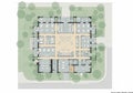 Watercolor-style rendering of a large building floor plan with an open central area Royalty Free Stock Photo