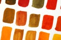 Watercolor swatches of warm colors on white background Royalty Free Stock Photo