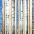 Watercolor of Unique skyscraper design featuring a Fibonacci spiral and windows arranged in a logarithmic spiral