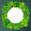 Watercolor wreath with green trefoil and quatrefoil shamrocks. Design of a bright illustration of jewelry for St