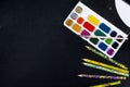 Watercolors and pencils on a black background. Top view. Copy sp Royalty Free Stock Photo