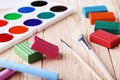 Watercolors, plasticine, crayons and brushes Royalty Free Stock Photo