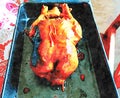 Watercolorstyle representing a baked orange duck ready to be served