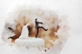 Watercolour concept groom doll and statue is running away but bride can catch him finally. the funny wedding story doll on the top Royalty Free Stock Photo