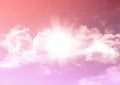 Watercolour style sugar cotton candy clouds background with sunburst Royalty Free Stock Photo