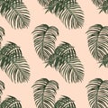 Watercolour tropical leaves seamless pattern. Exotic green palm foliage on warm pink background