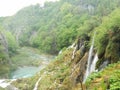 Waterfal, lake cascades, canyon and wooden bridge in Plitvice Lakes National Park