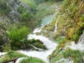 Waterfal, lake cascades, canyon and wooden bridge in Plitvice Lakes National Park