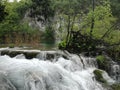 Waterfal, lake cascades, canyon and wooden bridge in Plitvice Lakes National Park