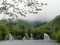 Waterfal, lake cascades, canyon and wooden bridge in Plitvice Lakes National Park