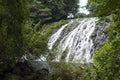 Waterfall along rugged rock