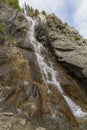 Waterfall in Altay mountains. Beautiful nature landscape.