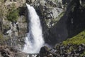 Waterfall in Altay mountains. Beautiful nature landscape. Popular touristic distination.