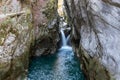 Waterfall in the Areuse gorge surrounded by steep cliffs, switzerland