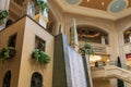 The waterfall atrium surrounded by lush green trees and plants at The Venetian Resort and Hotel in Las Vegas Nevada Royalty Free Stock Photo