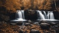 waterfall in autumn forest black and white photo Waterfall panorama view in autumn with rocks and foliage.