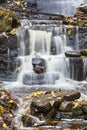 Waterfall with autumn leaves Royalty Free Stock Photo