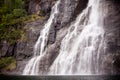 Waterfall on the bank of Lysefjorden in Norway Royalty Free Stock Photo