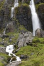 Waterfall and basaltic rocks. Iceland. Seydisfjordur.