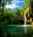 Waterfall and a beautiful lagoon lake for relaxing in the summer