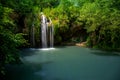 Waterfall and a beautiful lagoon lake for relaxing in the summer forest