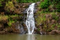 Waterfall in the botanical garden of Waimea Valley, Oahu, Hawaii