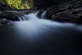 Waterfall at the carpatian mountains green forest