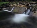 Waterfall at the carpatian mountains green forest