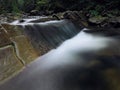 Waterfall at the carpatian mountains green forest