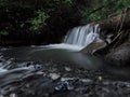 Waterfall at the carpatian mountains green forest