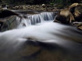 Waterfall at the carpatian mountains green forest