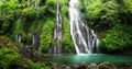 Waterfall cascade in tropical rainforest with rock and turquoise blue pond. 