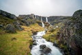 Waterfall cascades near Mjoifjordur and Klifbrekkufossar in East Iceland.