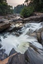 Waterfall cascades,over jagged rocks and boulders at Maak Ngaew falls,near Pakse,Southern Laos