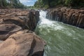 Waterfall cascades,over jagged rocks and boulders at Maak Ngaew falls,near Pakse,Southern Laos