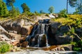 Waterfall cascading over rocks in Sapokka landscaping park Kotka, Finland