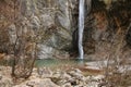 Waterfall Cascata Del Palvico with green lake Royalty Free Stock Photo