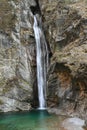 Waterfall Cascata Del Palvico with green lake Royalty Free Stock Photo