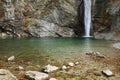 Waterfall Cascata Del Palvico with green lake Royalty Free Stock Photo