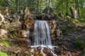 Waterfall at the casino park in spring, Georgsmarienhuette, Osnabrueck country, Lower Saxony, Germany