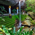 Waterfall and the cave temple at Ubon Ratchathani in Thailand