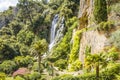 Waterfall and cave troglodyte