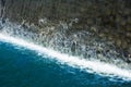 Waterfall close up image. Splashes and foam on blue water surface from fallen vertical cascade flow Royalty Free Stock Photo