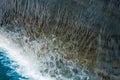 Waterfall close up image. Splashes and foam on blue water surface from fallen vertical cascade flow Royalty Free Stock Photo