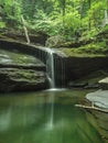Waterfall in the Cloudland Canyon State Park surrounded by greenery and stones Royalty Free Stock Photo