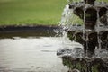 A waterfall coming out of the water