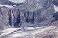 waterfall crashing down into valley from glacial fields near mount rainier Royalty Free Stock Photo