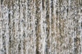 Waterfall curtain splash in garden pool for relax and refreshing Travel in sunny day. Water fall background