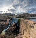 The waterfall and dam of the Elche Reservoir and lake in Alicante Province of Spain Royalty Free Stock Photo